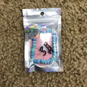 im selling this cute clay bead blue and white bracelet!